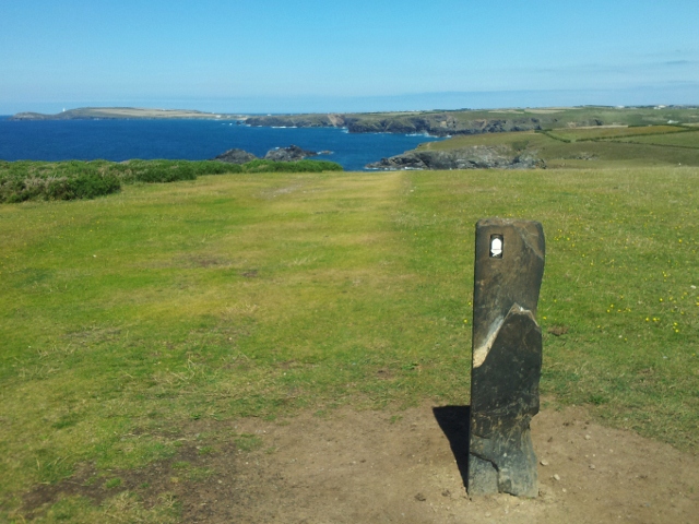 South West Coast Path trail marker near Porth Mear