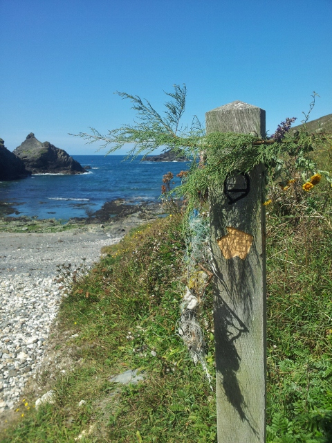 Decorated South West Coast Path trail marker